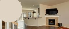 a living room filled with furniture and a flat screen tv mounted on the wall above a fireplace