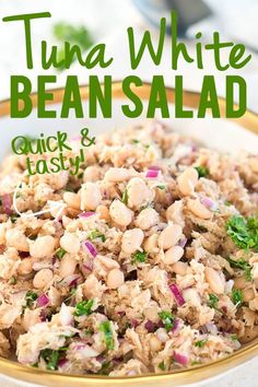 tuna and bean salad in a bowl with the words tuna white bean salad on top