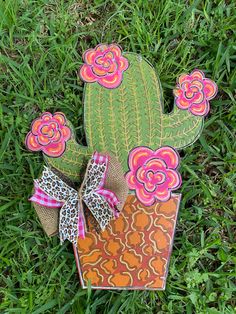 an image of a cactus decoration on the grass