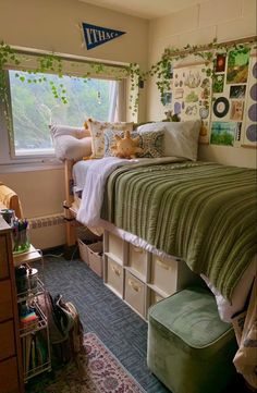 a bedroom with a bed, dressers and drawers in it's corner next to a window