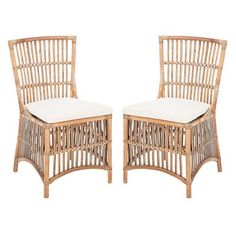 two chairs made out of bamboo with white cushions