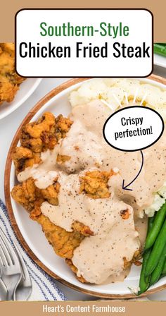 chicken fried steak with gravy and green beans on a plate next to mashed potatoes