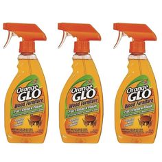 three bottles of orange glo wood furniture cleaner