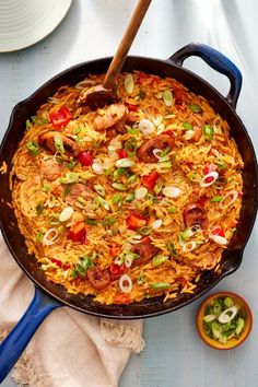 a skillet filled with food on top of a table