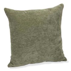 a green pillow on a white background