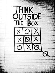 a piece of paper with the words think outside the box written on it