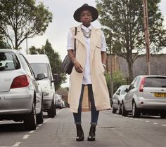 I can't say enough about the outfit - The over-sized white button-up shirt, the sleeveless yellow trench coat, cuffed skinny blue jeans and last but def not least the hat. The hat! Love the outfit, but what puts it all together is the necklace. It's the Necklace! Yellow Trench Coat, Sleeveless Trench, White Button Up, Uk Fashion, Lifestyle Blog, Blue Jeans, Button Up Shirts