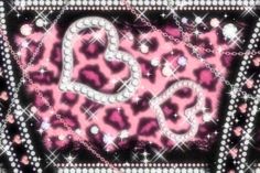 a pink and black leopard print with hearts on it's side, surrounded by diamonds