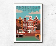 an image of amsterdam holland with boats on the water and buildings in the background framed print