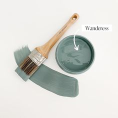 a paintbrush and bowl with the words wanderess on it next to each other