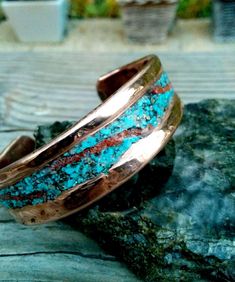 "* Turquoise and Coral Inlay Copper Bracelet. * Polished and Shiny. Waxed Finished. Other your finish will be done by the request. Please contact. * Lacquered will be done by the request. * 0.5\" and 0.75\" Wide Choice. Please mark your wide on the option. * Mark your wrist size on the option. Special Tight or Loose Looks will be done by the request. Leave it on the Note." Handmade Turquoise Copper Bracelets, Artisan Turquoise Copper Bracelet, Handmade Turquoise Copper Bracelet, Adjustable Turquoise Bracelet With Patina, Adjustable Turquoise Bracelets With Patina, Turquoise Cuff Bracelet With Natural Stones, Rustic Handmade Turquoise Cuff Bracelet, Rustic Turquoise Bracelet Jewelry, Spiritual Turquoise Cuff Bracelet With Natural Stones