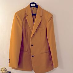 Pristine, Never Worn, Golden Yellow Blazer. Technically Unisex, But Sized For A Woman. Includes Inside Pockets On Both Sides. Size 4 Regular, Nwt. Tailored Yellow Outerwear For Office, Fitted Yellow Blazer For Business, Yellow Notch Lapel Outerwear For Office, Classic Yellow Blazer For Business, Classic Yellow Blazer For Office, Yellow Notch Lapel Blazer For Work, Tailored Yellow Outerwear For Formal Occasions, Tailored Yellow Formal Outerwear, Yellow Fitted Blazer With Lapel Collar