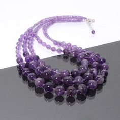 PRODUCT DETAIL :ITEM : PURPLE AMETHYST BEADED NECKLACEITEM CODE :  DGC3037ITEM NAME :NECKLACEGEMSTONE :  PURPLE AMETHYSTBEADS SHAPE : SMOOTH ROUNDLENGTH :   17"-19" INCH APPROXBEADS SIZE:  3mm/6-12 MM ApproxWEIGHT :  431 Cts. APPROXCUSTOMIZATION/BULK ORDER : AVAILABLEPLEASE FEEL FREE TO CONTACT IF YOU REQUIRE ANY FURTHER INFORMATION. Luxury Briolette Beaded Necklace With Polished Beads, Cheap Lavender Beaded Necklaces For Gifts, Cheap Oval Gemstone Beads Necklaces, Luxury Oval Beads Beaded Necklace For Gift, Purple Round Crystal Healing Necklace, Purple Crystal Healing Necklace, Lavender Round Beads Spiritual Necklace, Purple Amethyst Faceted Bead Crystal Necklaces, Purple Amethyst Crystal Necklaces With Faceted Beads