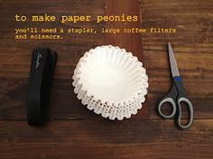 a cupcake liner, paper plate and scissors on a wooden table with the words to make paper ponies you'll need a stapler, large coffee filters and scissors