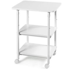 a white table with two shelves on each side