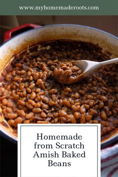 homemade from scratch amish baked beans in a large pot with a wooden spoon on top