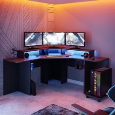 a computer desk with three monitors on it