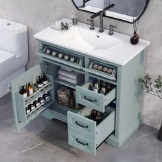 a bathroom with a sink and drawers in it