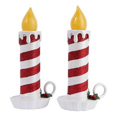 Mr. Christmas 10" Resin Candles Set of 2  This set of two 10" resin candles from Mr. Christmas makes adding a nostalgic touch to your holiday decor easy. LED illuminated, each candle features a decorative base with holly and berries. The candles are also battery-operated, so they can be placed in a window, on your dining table, on a bookcase, or anywhere else needing a little light this holiday season.   What You Get       Set of 2 10" Resin Candles      User manual Red Gingham Christmas, Led Resin, Gingham Christmas, Striped Candles, Red Christmas Decor, Candy Cane Lane, Glitter Candles, Christmas Tabletop Decor, Mr Christmas