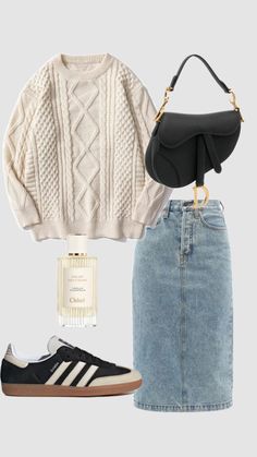 a white sweater, black top and blue denim skirt with adidas on the side