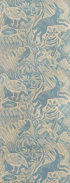 a blue and white wallpaper with animals on it