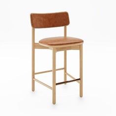 a wooden chair with a leather seat and backrest on an isolated white background,