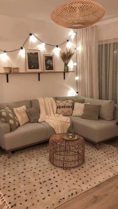 a living room filled with furniture and lights