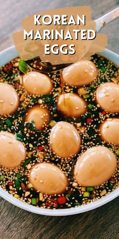 korean marinated eggs in a bowl with sesame seeds