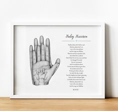 a black and white photo of a baby's hand with the poem, baby heaven