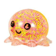 a pink and yellow jelly with black eyes