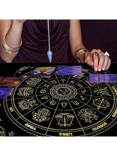 a woman is holding onto the wheel of zodiac signs in front of an astro sign