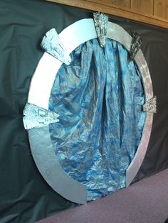 an image of a blue curtain in the shape of a circle