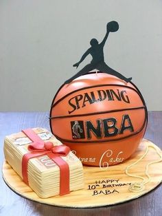 a birthday cake made to look like a basketball