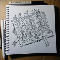 a drawing of an open book on top of a table