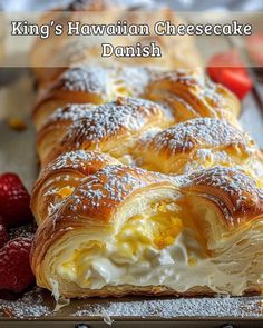 king's hawaiian cheesecake danish with raspberries and powdered sugar on top