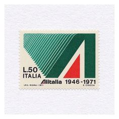 an italian postage stamp with the image of a green, red and white triangle on it