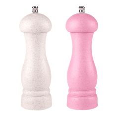 two salt and pepper shakers in pink and white speckles on a white background