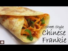 a close up of a burrito on a white plate with the words street style chinese frankie