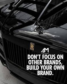 a black car with the words don't focus on other brands build your own brand