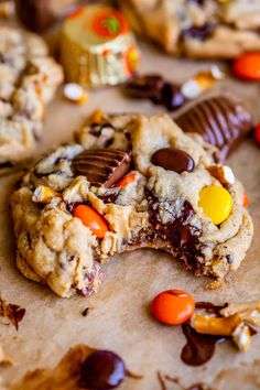 chocolate chip cookies with candy and m & ms in the middle