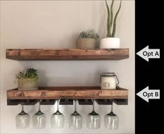 two wooden shelves with wine glasses on them