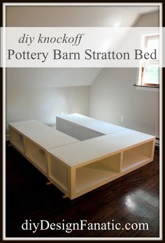 an empty room with white walls and wooden flooring in the center, there is a built - in storage area for pottery barn station bed