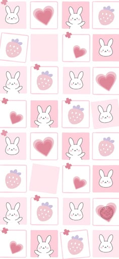 some pink and white squares with rabbits on them, one has hearts in the middle