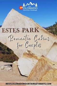 a large rock with the words ests park romantic cabins for couples