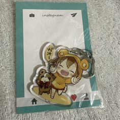 a keychain with a cartoon character on it