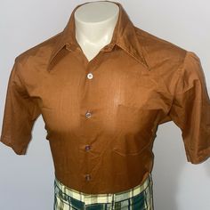 Armpit to armpit - 23.5 inches Length                - 30.5 inches You are bidding on a very groovy, vintage Hampshire House by Van Heusen short sleeve dress shirt. It is in very nice condition. The shirt is dark brown with clear buttons. The shirt has a wide collar, is button front, has one chest pocket. and is a dacron polyester/ cotton blend. The size stamp reads size 16.5 Half Sleeve (similar to a Mens Large), but exact measurements are provided. Pants are not included. Please email me with 1960s Men, Hampshire House, 70s Clothes, Collar Shirt Men, Short Sleeve Dress Shirt, Van Heusen, 50s Fashion, Half Sleeve, Collar Shirts