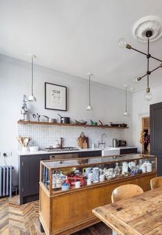 the kitchen is clean and ready to be used for breakfast or dinner time, as well as many other things in the room