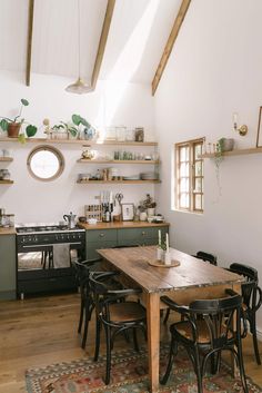 the kitchen is clean and ready to be used as a dining room or living area