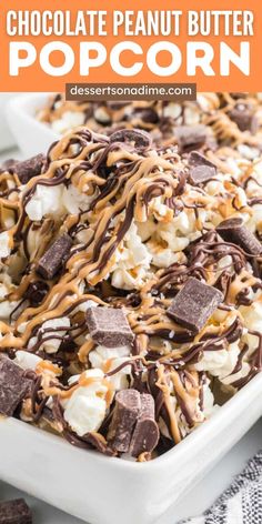 chocolate peanut butter popcorn with marshmallows and caramel drizzle on top