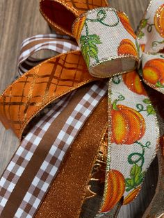 an orange and brown ribbon with pumpkins on it